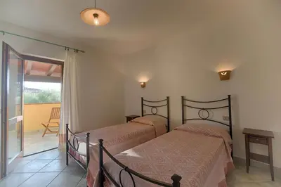 Letto o letti in una camera di Residence Oasi e Oasi Blu