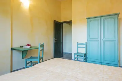 Letto o letti in una camera di Camere Magnolia