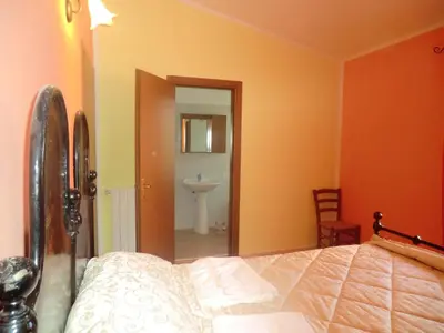 Letto o letti in una camera di Agriturismo Lerno