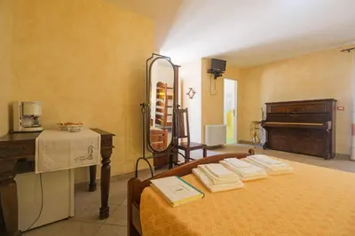 Letto o letti in una camera di Melalidone