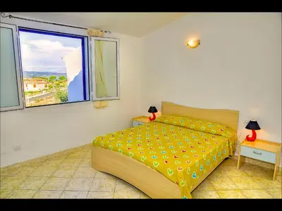 Letto o letti in una camera di Residenze Mare e Pineta