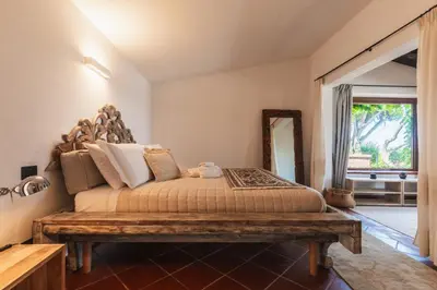 Letto o letti in una camera di Villa Caterina