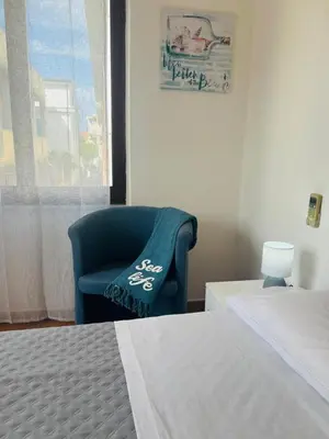 Letto o letti in una camera di Il Canarino affittacamere