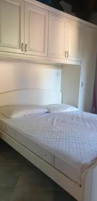 Letto o letti in una camera di Residenze Coda Cavallo