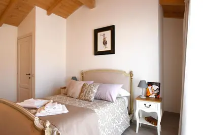 Letto o letti in una camera di La Dimora di San Simplicio