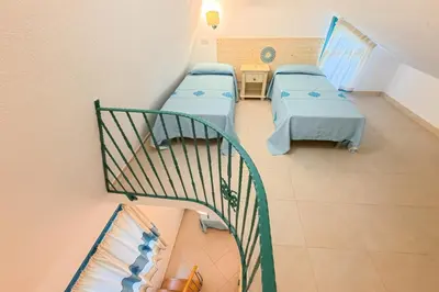 Letto o letti in una camera di Hotiday Apartments Villa Alba