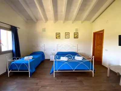 Letto o letti in una camera di Janas B&B
