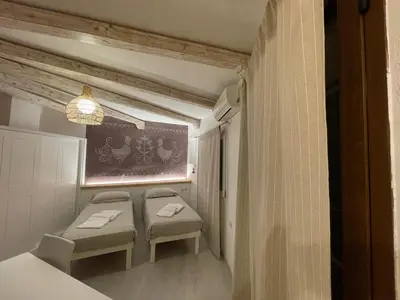 Letto o letti in una camera di Domus de Diana