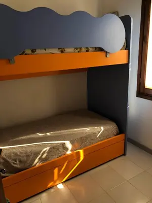 Letto o letti in una camera di Appartamento Iris 300 mt spiaggia