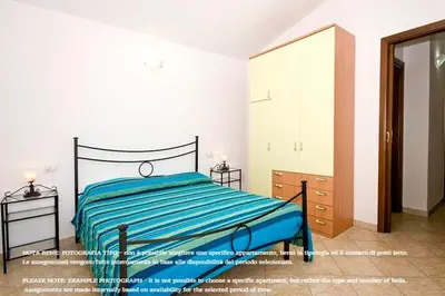 Letto o letti in una camera di Appartamenti Tanaunella