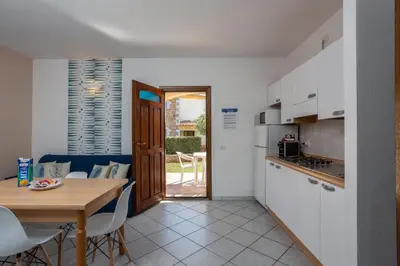 Cucina o angolo cottura di Appartamenti Tanaunella