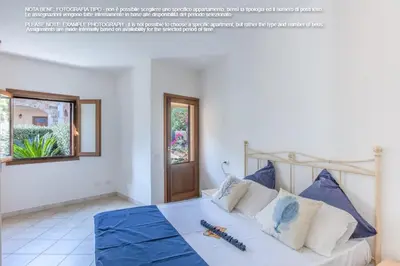 Letto o letti in una camera di Appartamenti Tanaunella