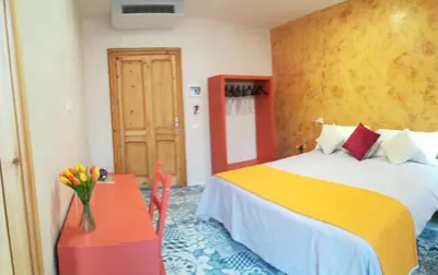 Letto o letti in una camera di Casa Orrù