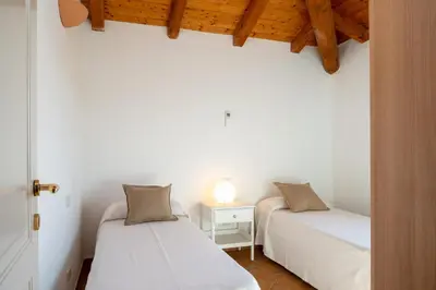 Letto o letti in una camera di Bellosguardo 3, 8 - Klodge