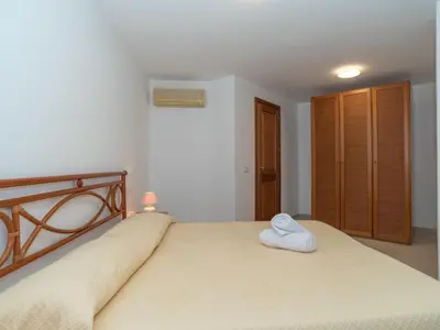 Letto o letti in una camera di Holiday Home Corbezzolo 7 - Vista Village by Interhome