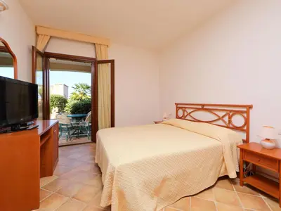 TV o dispositivi per l'intrattenimento presso Holiday Home Corbezzolo 9 - Vista Village by Interhome