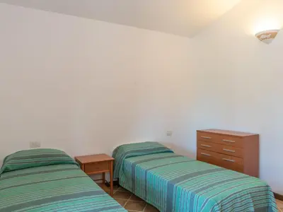 Letto o letti in una camera di Holiday Home Corbezzolo 10 - Vista Village by Interhome