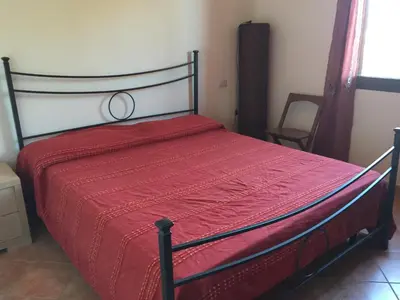 Letto o letti in una camera di Domo Giulia
