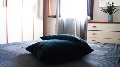 Letto o letti in una camera di Domo Sara