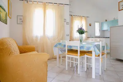 Area soggiorno di Appartamenti Costa - BUDONI SWEET HOME