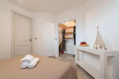 Letto o letti in una camera di Apartment in Cala Gonone 34714