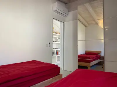 Letto o letti in una camera di Residence Il Borgo Del Mare - BUDONI SWEET HOME