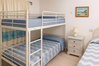 Letto o letti in una camera di Wind Rose -Group Beach House near the Sea
