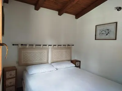 Letto o letti in una camera di Le Residenze del Mare - Villa Michael