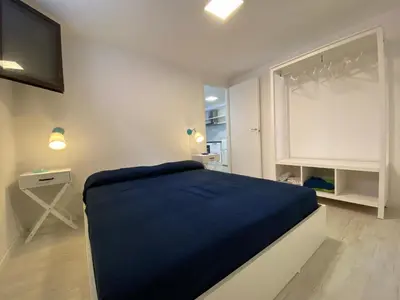 Letto o letti in una camera di BEACH HOUSE TANAUNELLA