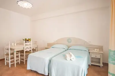 Letto o letti in una camera di Le Residenze di Via Leonardo da Vinci 14