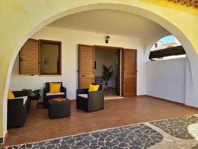 Area soggiorno di Le Melodie - Appartamenti con spazi esterni privati a Sos Alinos