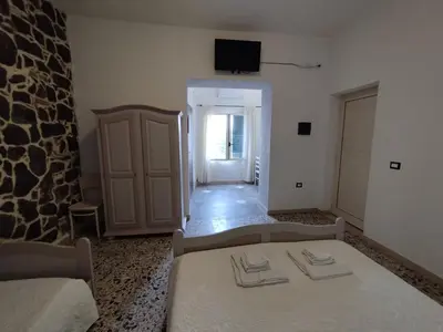 Letto o letti in una camera di Villa Bianca