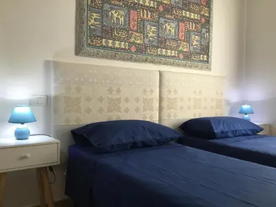 Letto o letti in una camera di B&B Levante Posada