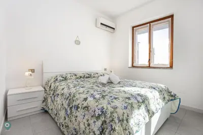Letto o letti in una camera di Villino Gramsci