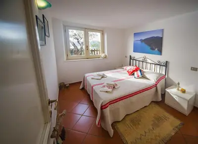 Letto o letti in una camera di Casa Delta delle Acque Vista spettacolare e Giardino
