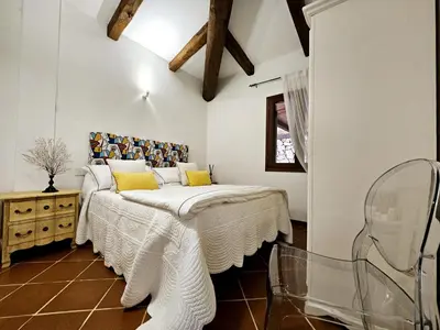 Letto o letti in una camera di Villa Capo Coda Cavallo piscina privata