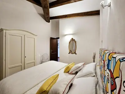 Letto o letti in una camera di Villa Capo Coda Cavallo piscina privata