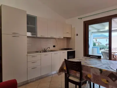 Cucina o angolo cottura di Residenze S'ABBAIDA - BUDONI SWEET HOME