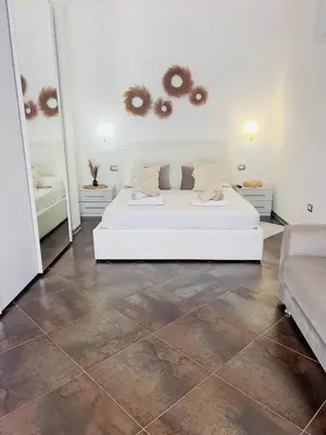 Letto o letti in una camera di Le residenze del mare