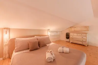 Letto o letti in una camera di Casa La Rocca