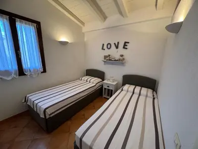 Letto o letti in una camera di Villa Carlotta