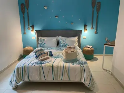 Letto o letti in una camera di Intra Rooms