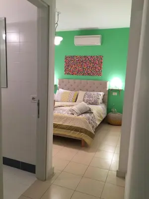 Letto o letti in una camera di Intra Rooms