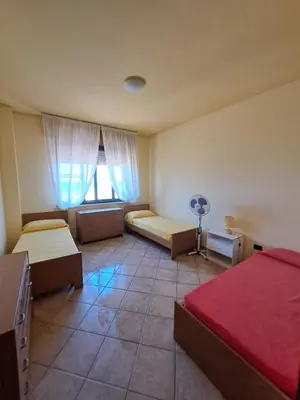 Letto o letti in una camera di Sulla Spiaggia