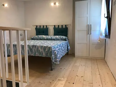 Letto o letti in una camera di villetta san teodoro IUN Q7135