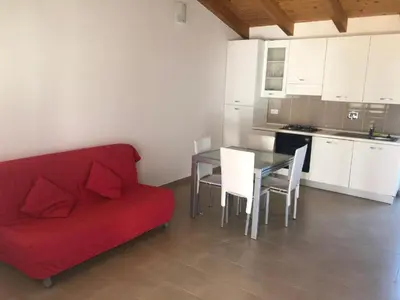 Cucina o angolo cottura di Trilocale con cortile