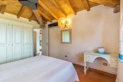 Letto o letti in una camera di Villa Danza dei Fenicotteri