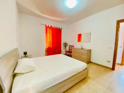 Letto o letti in una camera di Residence La Cinta 5