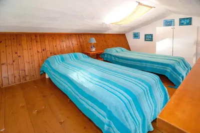 Letto o letti in una camera di CASA del CAPITANO