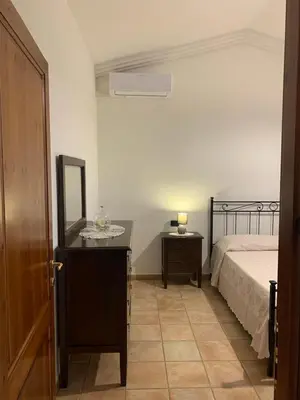 Letto o letti in una camera di VILLA LUPINO